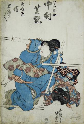 The actor Nakamura Shikan as Ohatsu dueling with wooden swords