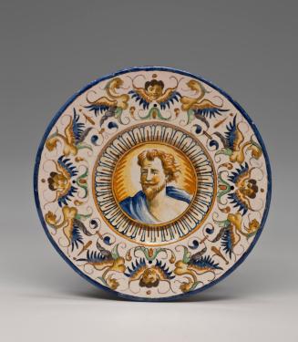 Maiolica Plate with presumed Head of Christ and Border Design of Birds and Cherubs
