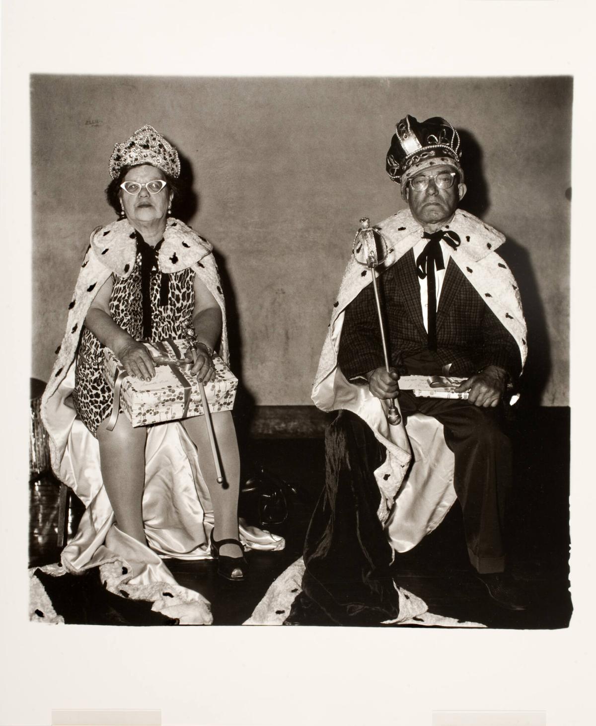 Their Numbers were Picked Out of a Hat. They Were Chosen King and Queen of a Senior Citizens Dance in NYC. Yetta Grandt is 72 and Charles Fahrer is 79. They Have Never Met Before, from the portfolio A Box of Ten Photographs