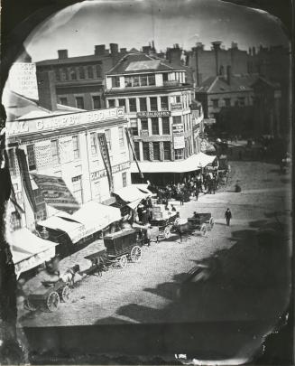 Untitled (Wagons in front of Boston Shops)