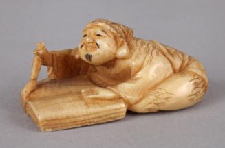 Netsuke of Daikokuten, God of Prosperity, Writing in a Book