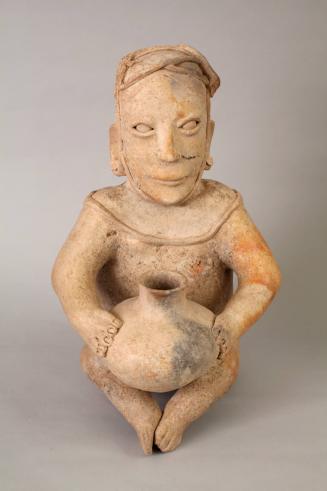 Seated Figure of a Woman Holding a Pot