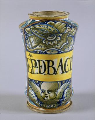 Maiolica Apothecary Jar with Floral Decoration and Medallion of a Cherub and Trophies