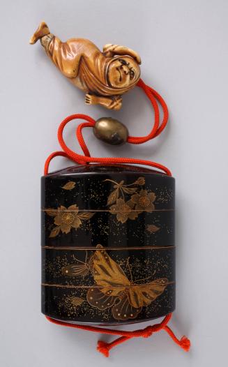 Inro with Butterfly and Flower motif, and Netsuke of a Reclining Figure