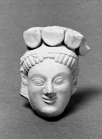 Female Head from a Votive Statuette