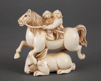 Ivory Carving of Two People Riding a Horse Atop a Hare