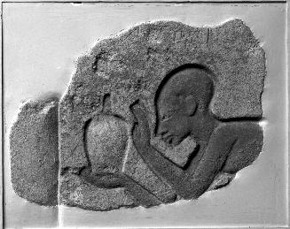 Fragment of a Relief with a Man Holding a Vase