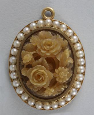 Carved Oval Pendant with Central Medallion of Roses