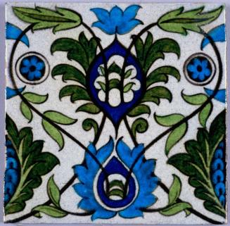 Hand-painted Pottery Tile with Persian-inspired Floral Design