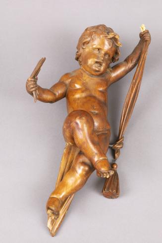 Carved Statuette of Cupid in a Swing