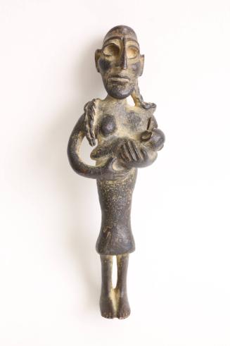 Woman Nursing a Child