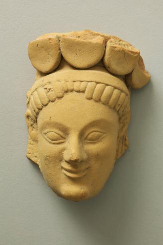 Female Head from a Votive Statuette