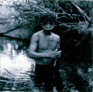 The Spearfisherman, el Rio Esmeralda, Communities of Population in Resistance (CPR) of the Peten, Guatemala