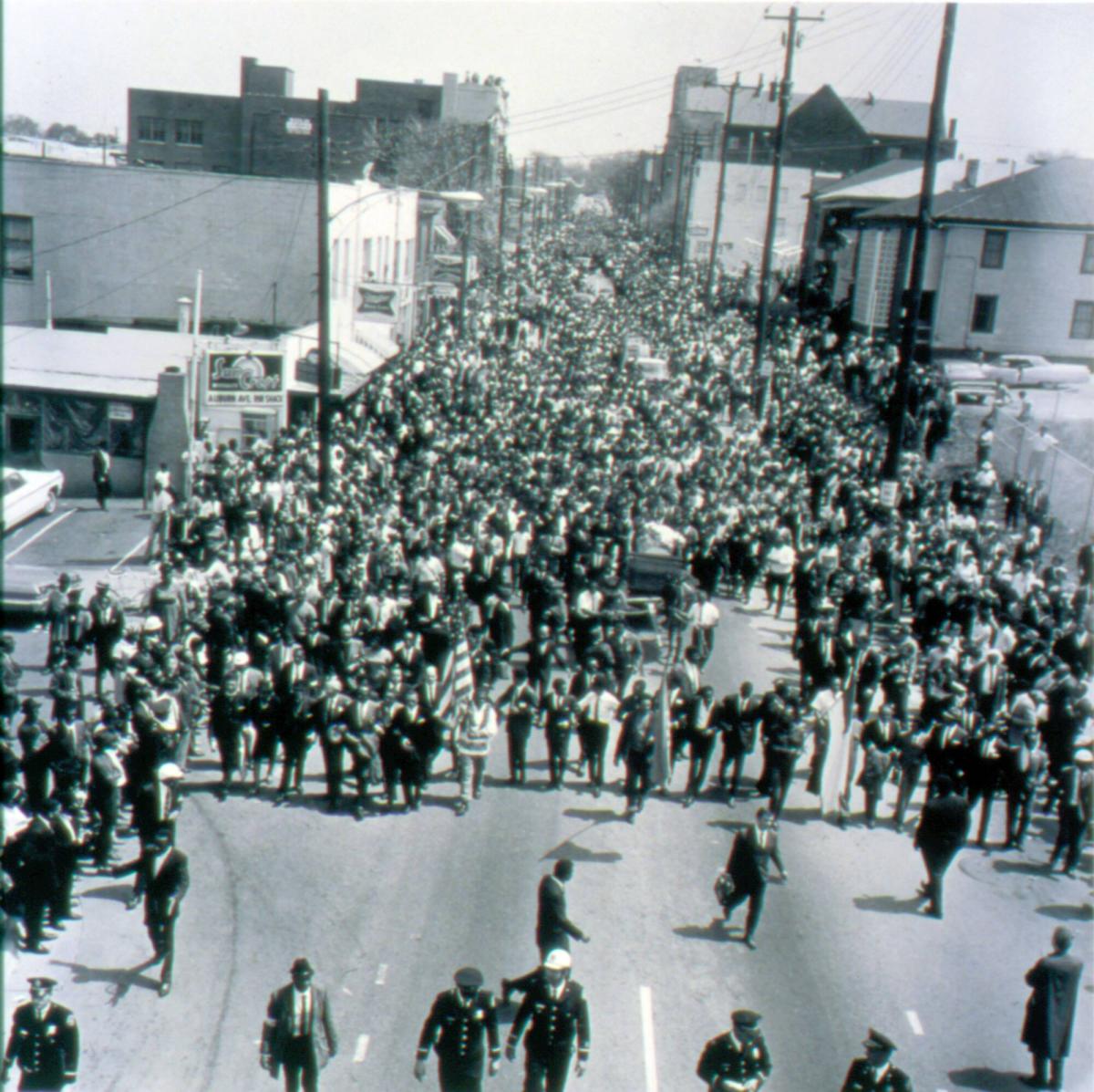 Martin Luther King Funeral Procession: Funeral Procession for Dr. Martin Luther King on Auburn Avenue after leaving King's church, Atlanta, Georgia, April 12th 1968, from the portfolio I am a Man